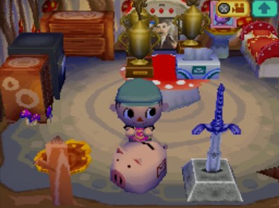 Putting bells into my new piggy bank in Animal Crossing: Wild World.