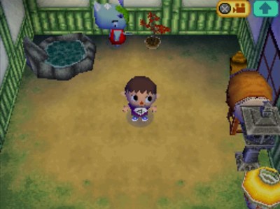 The inside of Tank's house in Animal Crossing: Wild World.