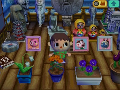 Truffles's pic on display in my house. Marina's pic and Mitzi's pic are also visible.