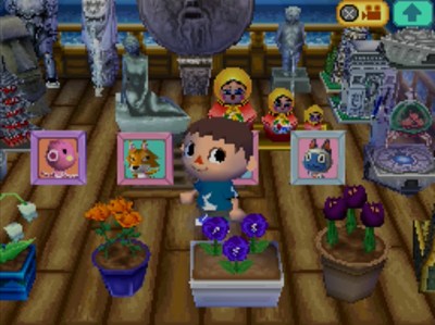 Chief's pic on display in house, next to Marina's pic. My Gulliver items are visible in the background.