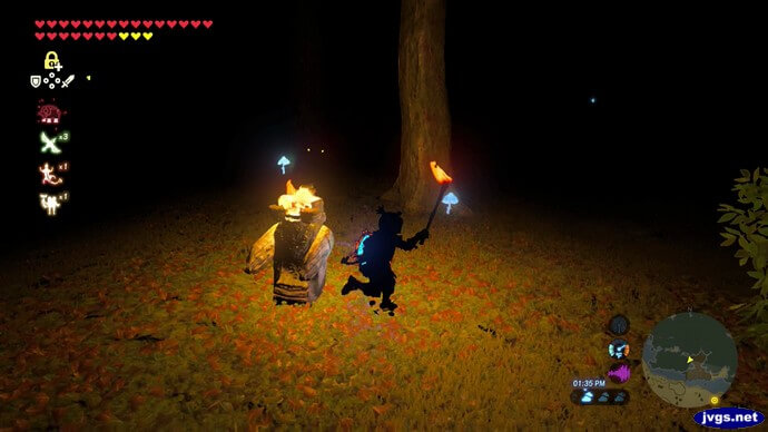 Link runs in darkness while holding a lit torch.