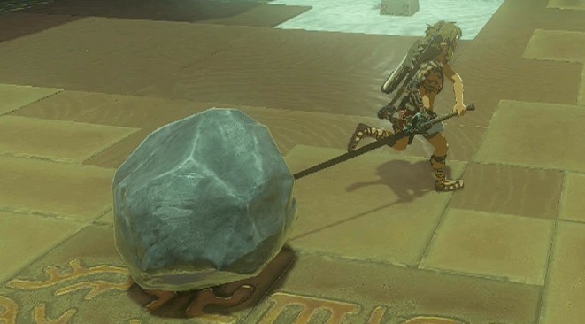 Link carries a sword with a boulder fused to it.