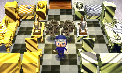 A room with silver and gold furniture in the dream town of Titania.