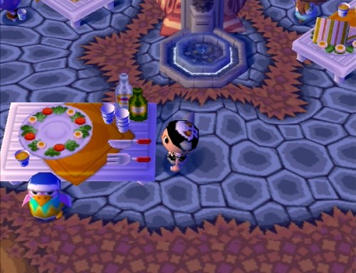 The silverware (knife and fork) at the banquet table.