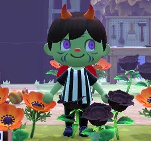 Me with green skin and face paint after being tricked by a villager (Hornsby) on Halloween.