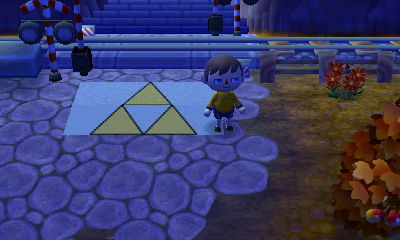 Triforce patterns on the ground in the town of Tg47.