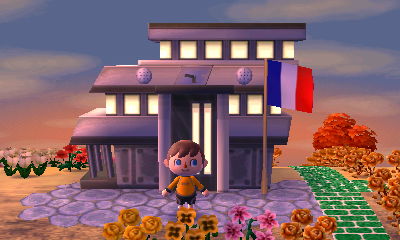 Modern town hall with the French flag flying.