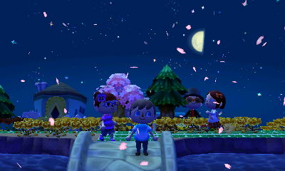 Cherry blossom petals falling from the night sky.