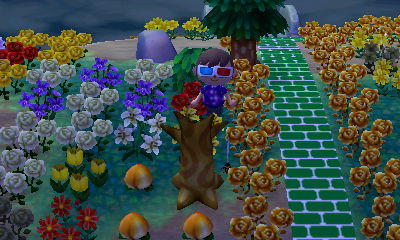 A spider hanging from a tree with no leaves.