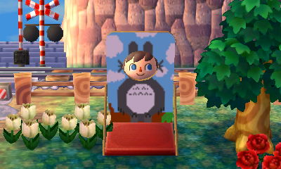 Sticking my face into Meli's face-cutout standee.