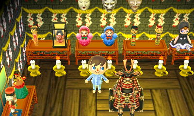 A room full of creepy dolls and masks in Hitokui.