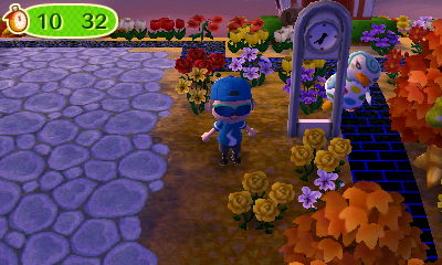 Sprinkle hiding behind the modern clock.