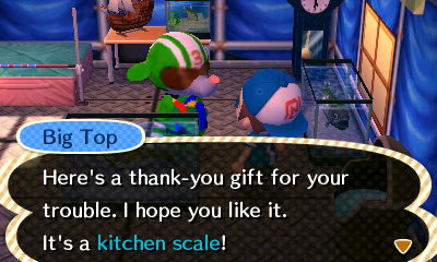 Big Top: Here's a thank-you gift for your trouble. I hope you like it. It's a kitchen scale!