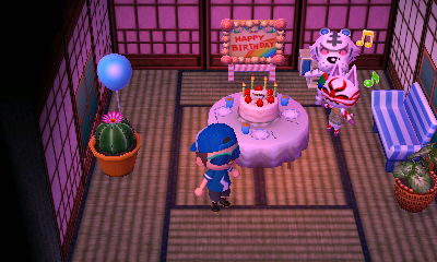Rolf helping Kabuki celebrate his birthday.