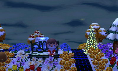 Santa sitting on the bench.