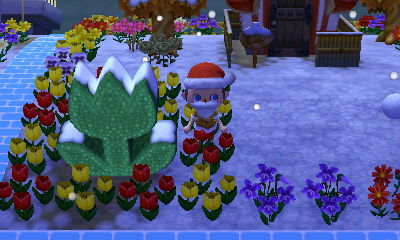 The tulip topiary with snow on it.