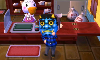 Wearing the blue ogre mask.