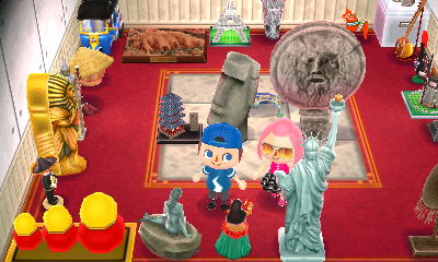 Madisyn visits my exhibit of Gulliver items.