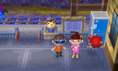 Madisyn and Laile putting on wet suits.