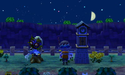 Wendy uses her watering can while sitting on a stump.