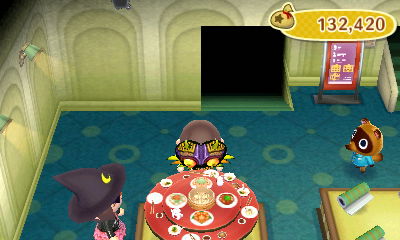 Eating from the lazy-Susan table in the shop.