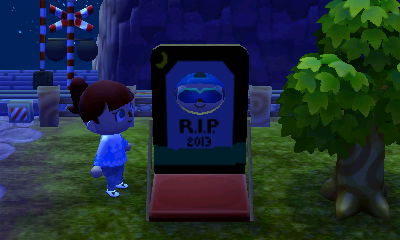 Poking my face through my gravestone standee.