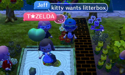 Wendy standing in the zen garden.