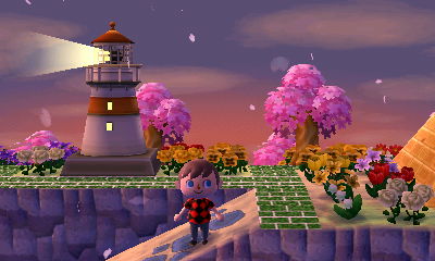 Cherry blossom petals falling near my lighthouse.