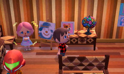 TZ acts scared of my clown painting.