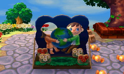 Hugging the world in the Nature Day standee.