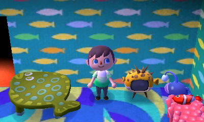 The flounder table and puffer-fish TV.