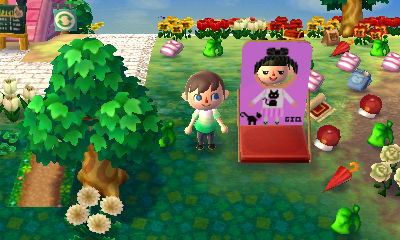 Gia's faceboard featuring a cat next to her and a cat on her shirt.