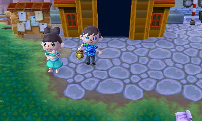 Michelle tries on her hair-bow wig.