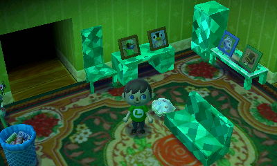 A green wall and fancy carpet.