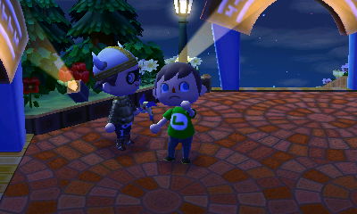 Getting a pinwheel from Arnold.