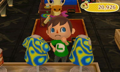 A coral tee and a coral tank on sale.