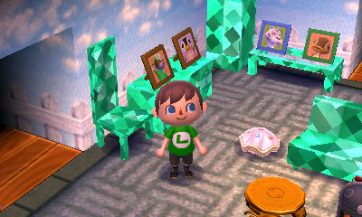 A sand garden and backyard fence.