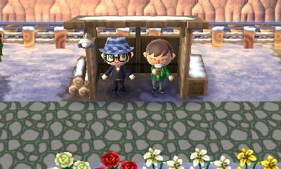 Kim and Jeff waiting at the bus stop.