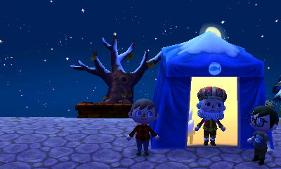 Tom stands in the doorway of the tent.