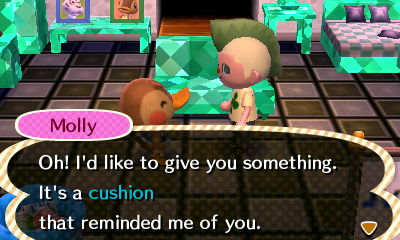 Molly: Oh! I'd like to give you something. It's a cushion that reminded me of you.