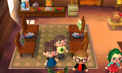 Four people on a Club Tortimer island.