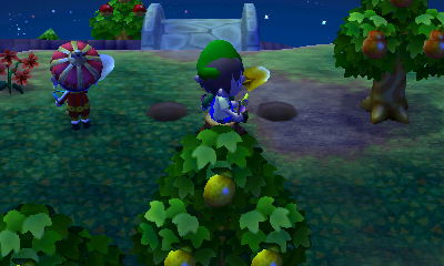 Two people sitting on a tree stump!