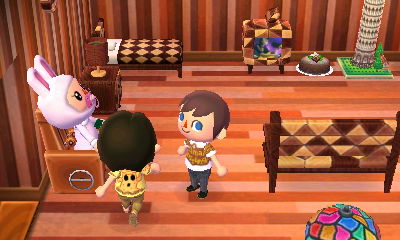 Georgie sits in the massage chair.