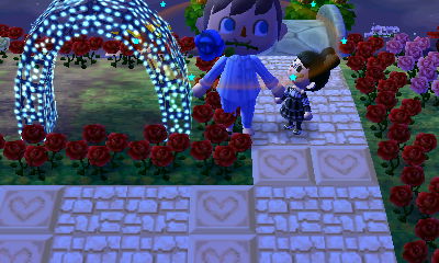 Giant-sized Jeff next to an illuminated arch.