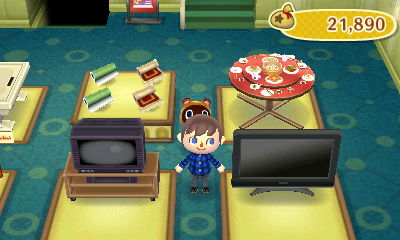 Two TVs on sale, right next to each other.