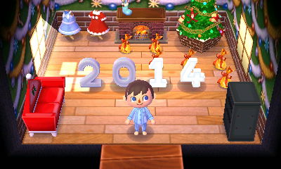 A Christmas themed room that's already for the new year with a large 2014 spelled out in number lamps.