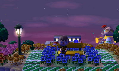 I sit on my yellow bench as a giant-sized Beth stands in the background.