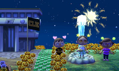 Beth stands on the geyser as it erupts. Fireworks explode in the background.