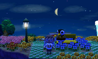 Aurora sits on a yellow bench in the park, near the street lamp. A geyser is visible in the distance.