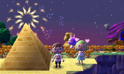 Me and watch as the fireworks appear near the top of the pyramid, making it resemble a Christmas tree with a star on top. Bob and my Sphinx can be seen in the background.